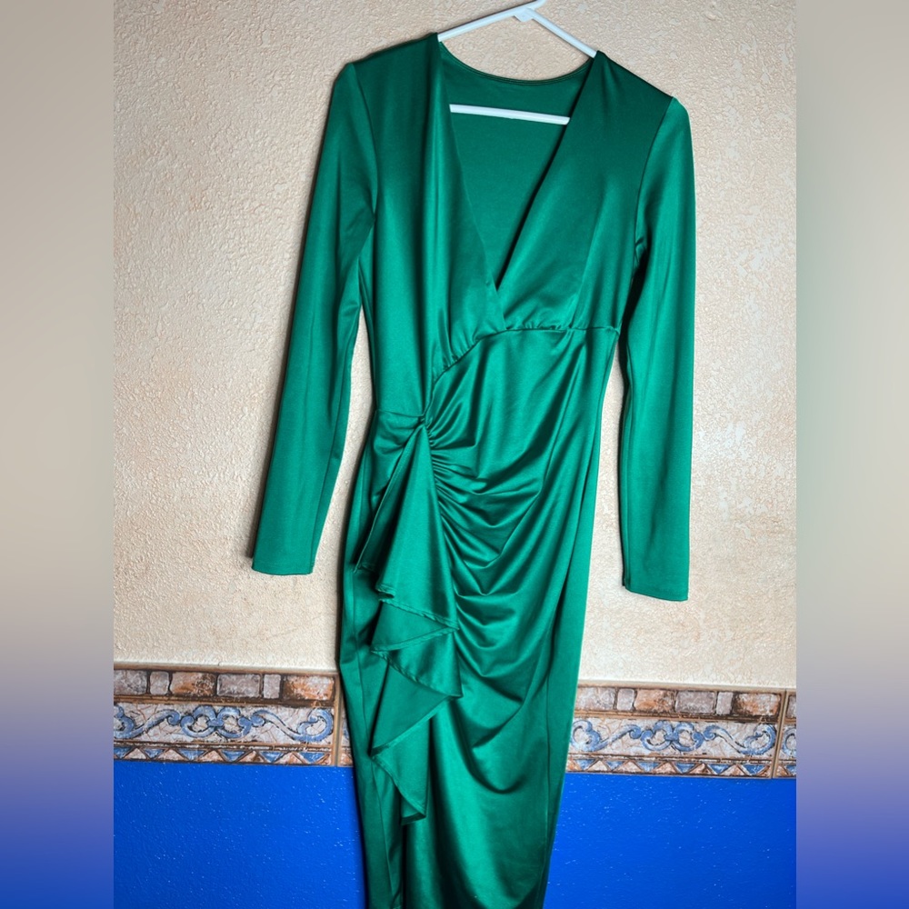 Green dress for a wedding.